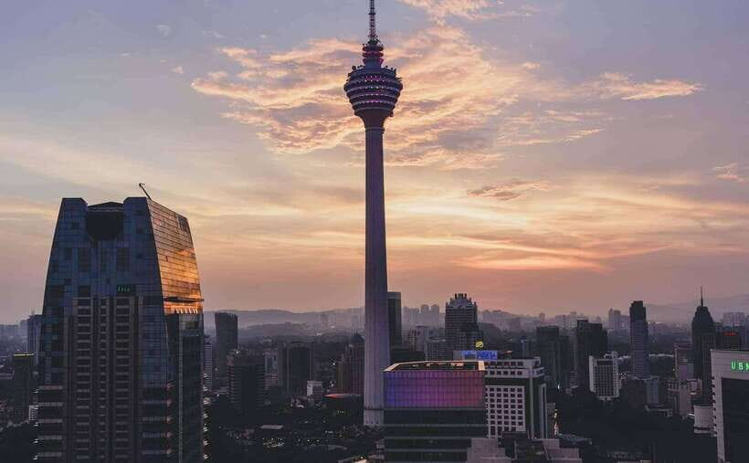 Kuala Lumpur City Tour with KL Tower Ticket - Getting picked up in the city and rolling with an English guide
