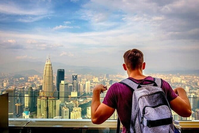 Private Kuala Lumpur City Tour with KL Tower & Batu Caves - Batu Caves: 272 steps and Lord Murugan’s golden welcome